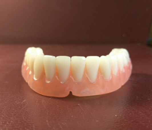 Ultra-thin lower denture, false teeth